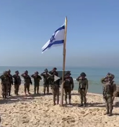 Soldiers Sing Hatikva and Plant Israeli Flag on the Beach of Gaza